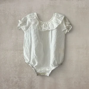 Camisa body plumeti. Manga corta